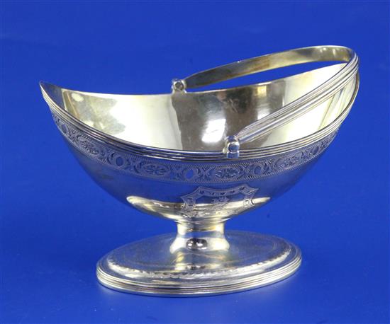 A George III silver boat shaped pedestal sugar basket, 5 oz.